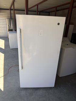 White GE Standing Freezer