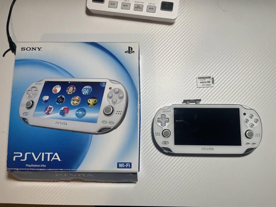 PS Vita OLED (1000) + SD2Vita Adapter, 64 GB Card,– Excellent Condition
