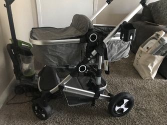 Big Baby Stroller/carriage Turns into sit up stroller 4 wheel drive collapsable with cup holder