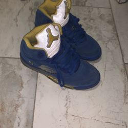 This is an Air Jordan 5 Retro "Laney Varsity Royal