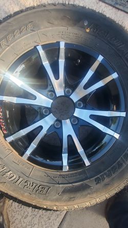 TRAILER TIRES AND WHEELS.