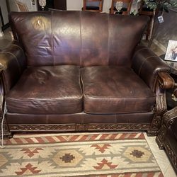 dark brown faux leather love seat