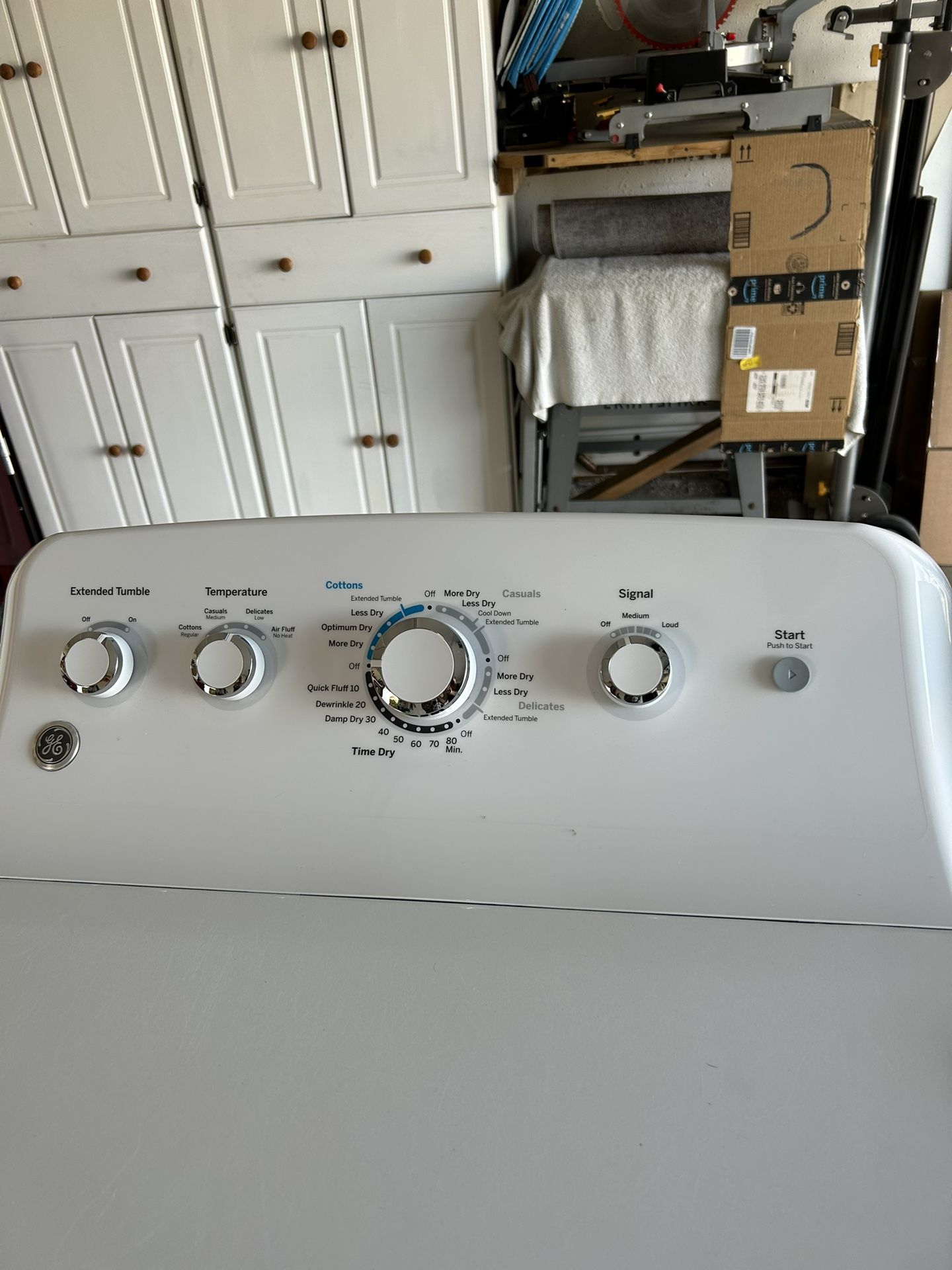 GE Electric Washer And Dryer Set Model Number GTW465ASNOWW.