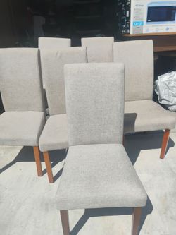 Six dining chairs with a table cherry wood nice