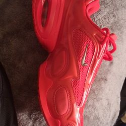 Nike Women's Air Max Muse in the "Habanero Red" colorway