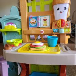 Fisher-Price Laugh & Learn Grow-the-Fun Garden to Kitchen