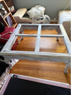 Coffee table with glass inserts