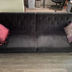 Black Tufted Sofa (folds out into bed)