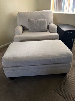 Gray/ Cream colored Upholstered Accent Chair with Ottoman