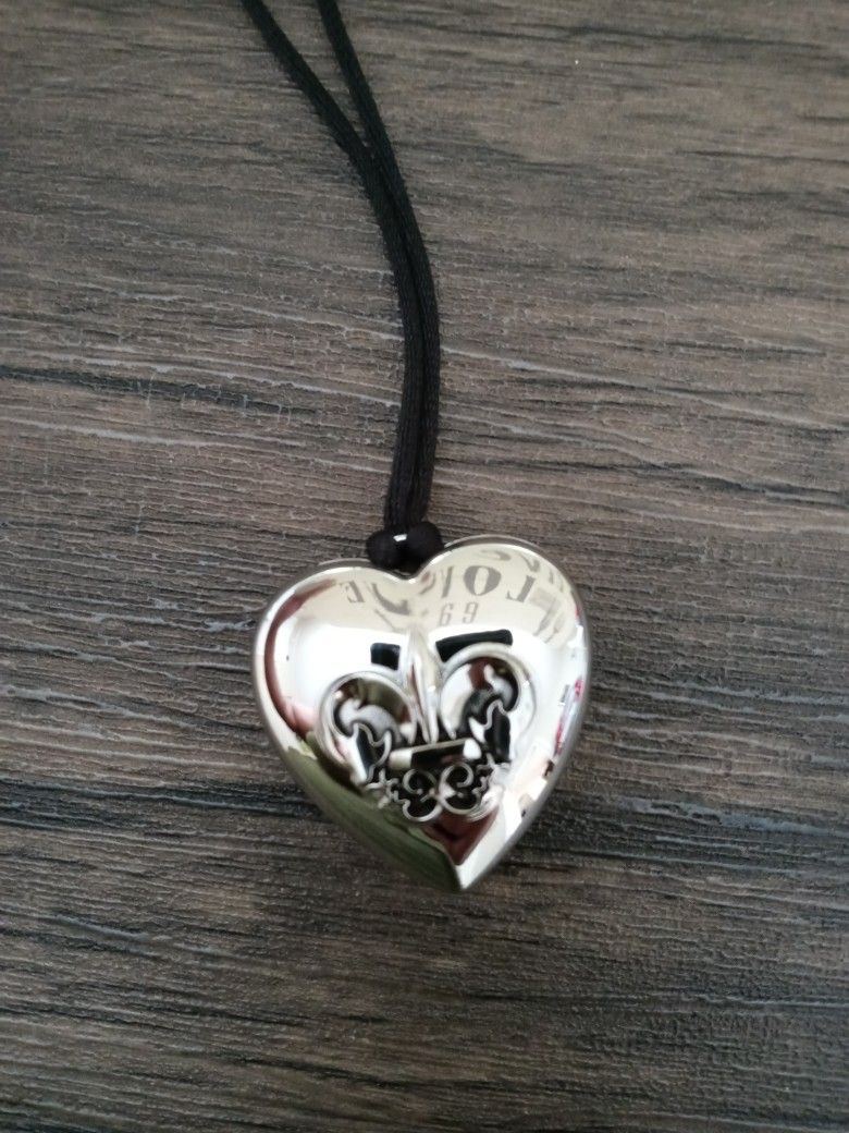 Outspoken By Fergie Perfume Pendant