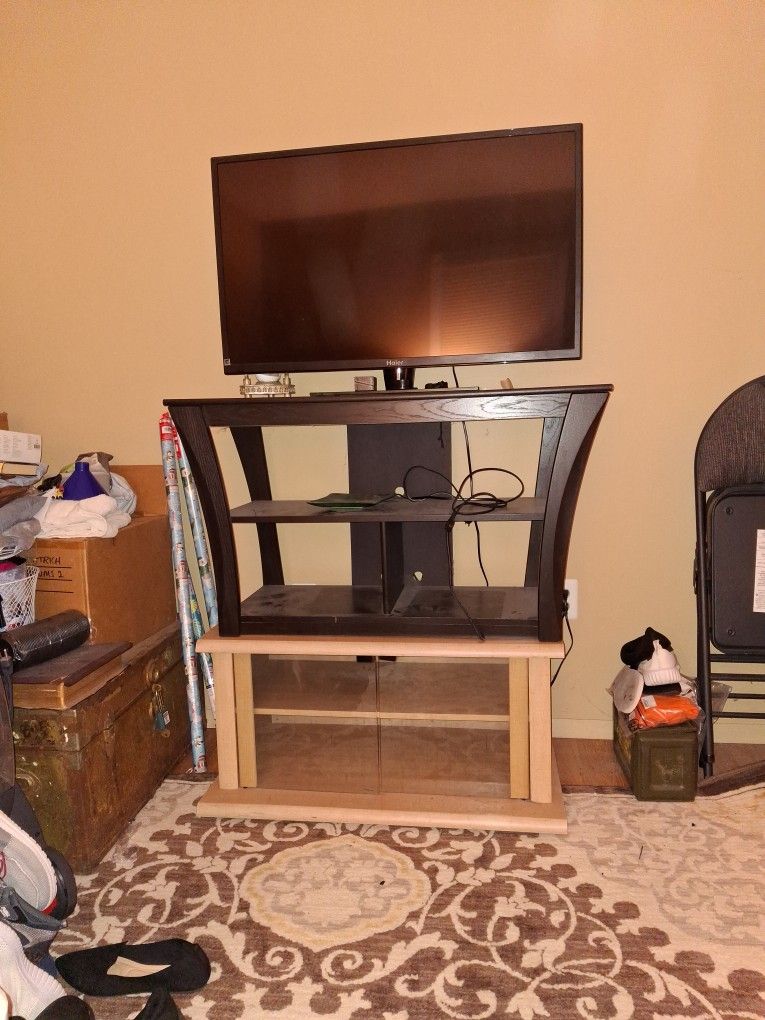 Two TV Stands And TV Must Go