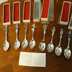 Reed And Barton Silverplate "Children of Christmas" Spoons,  Set of 8. 
