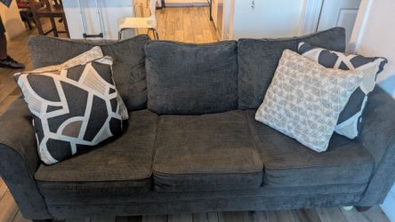 Gray Rooms to Go Three Seater Sleeper Couch