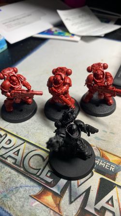 Primaris chaplain & 3 Eradicators