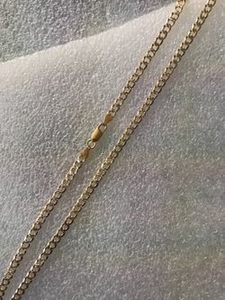 Silver chain in gold plating, cuts Diamonds.