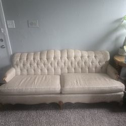 Antique Hollywood style tufted couch