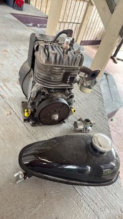 Small motor with gas tank