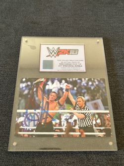 Wwe 2017 royal rumble ringmat piece with John cenas autograph.
