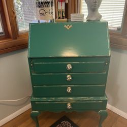 Green and gold writing bureau desk