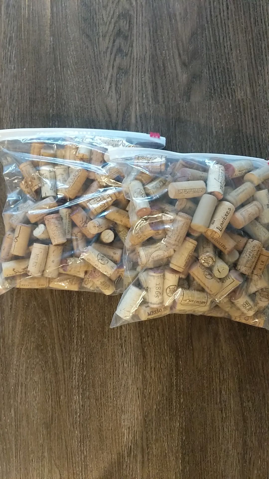 Two bags of wine corks