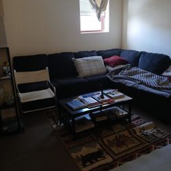 Black Sectional, New Condition. 