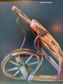 Antique wooden/metal wheelbarrow