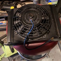 Transmission cooler size 12 in With 9 inches in height 2 inches in width cooler is brand new fan is used works excellent