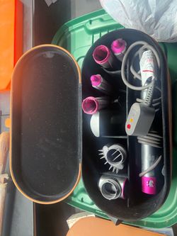 Dyson AirWrap with accessories and case