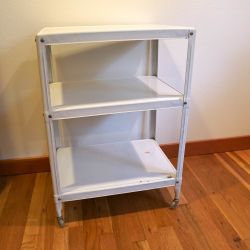 Fun vintage white metal rolling cart