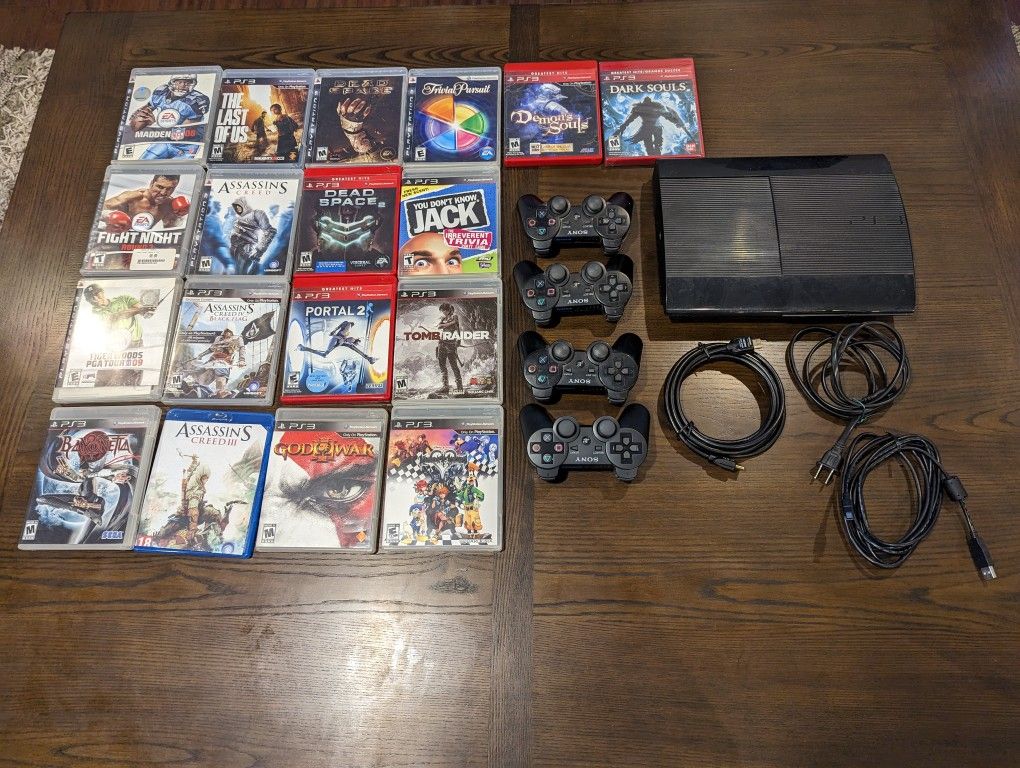 Playstation 3 with 18 games and 3 controllers for sale in glen ellyn