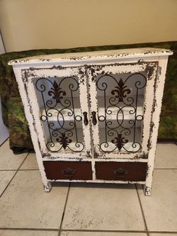 Ornate, and wood cabinet
