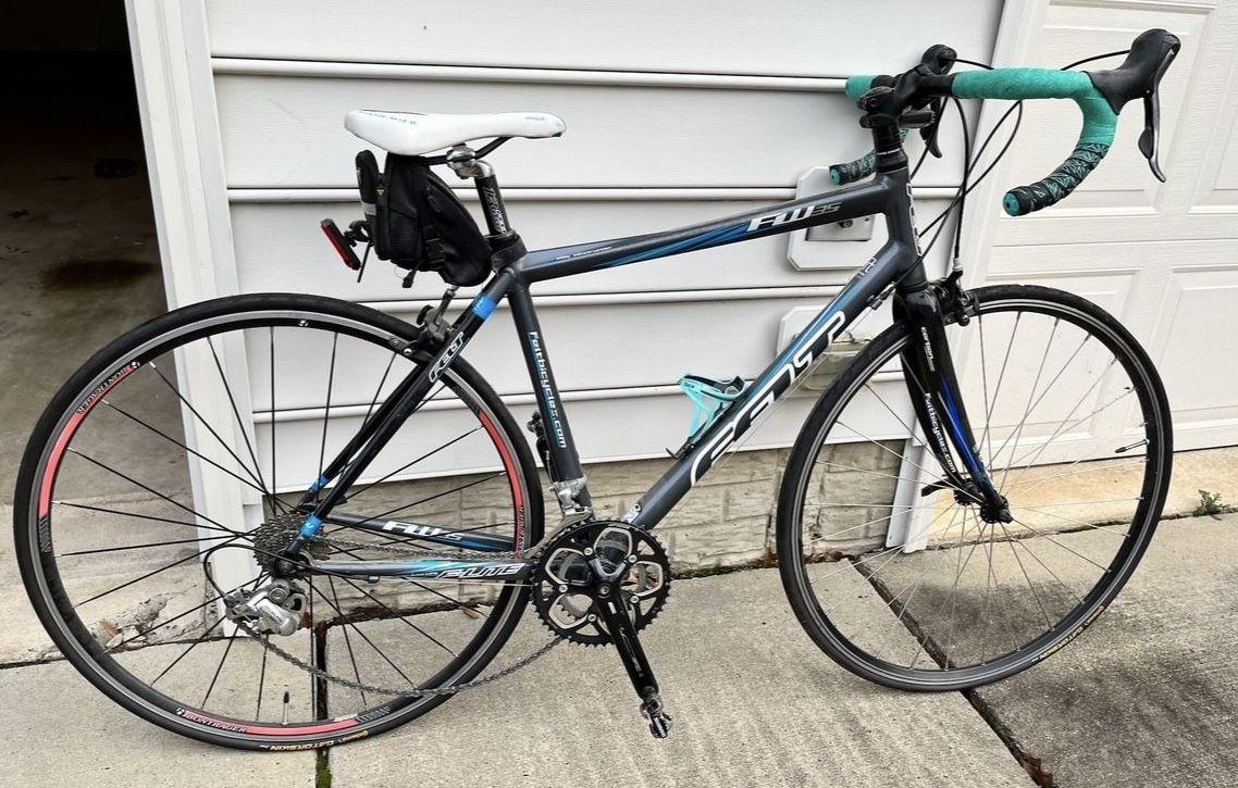 Felt Road Bike W/ Helmet