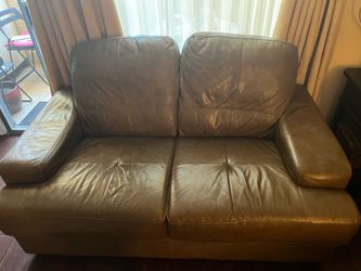Leather couch and loveseat light brown