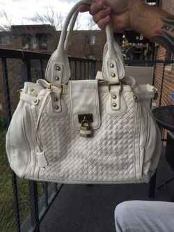 White charming Charlie's purse