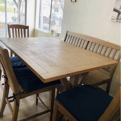 Carlyle Crossing Distressed Medium Brown Extendable Counter Height Dining Room Set