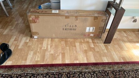 Dresser new in box . White in color