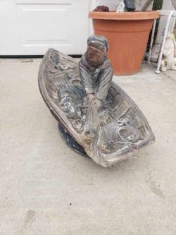 Vintage Concrete Fisherman Statue