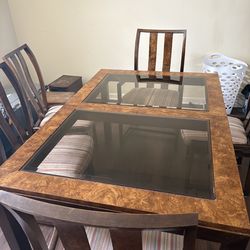 Table with 6 chairs and 2 leaf extensions.