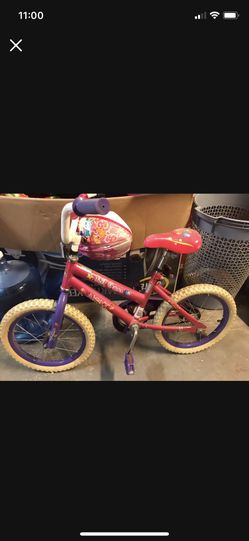 Toddler bike with training wheels and helmet