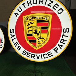 A PAIR OF PORSCHE SHOP SIGNS