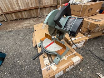Vintage Delta 10 inch motorized miter box saw. Model 34–080 works great.
