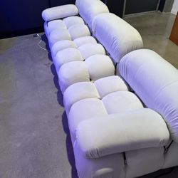 White Belia sectional suede sofa.