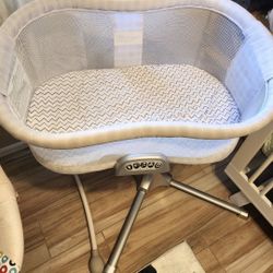 HALO BassiNest Swivel Sleeper bassinet. 
