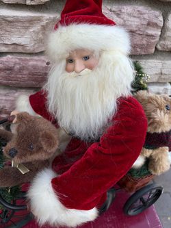 Decorative Santa Claus Figure with Teddy Bears