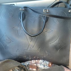 Louis Vuitton  On The Go Bag