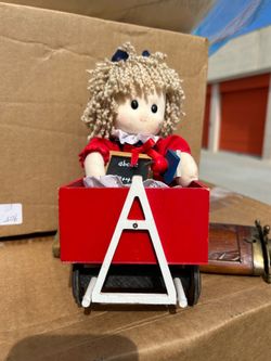 Berkeley designs musical doll in wagon