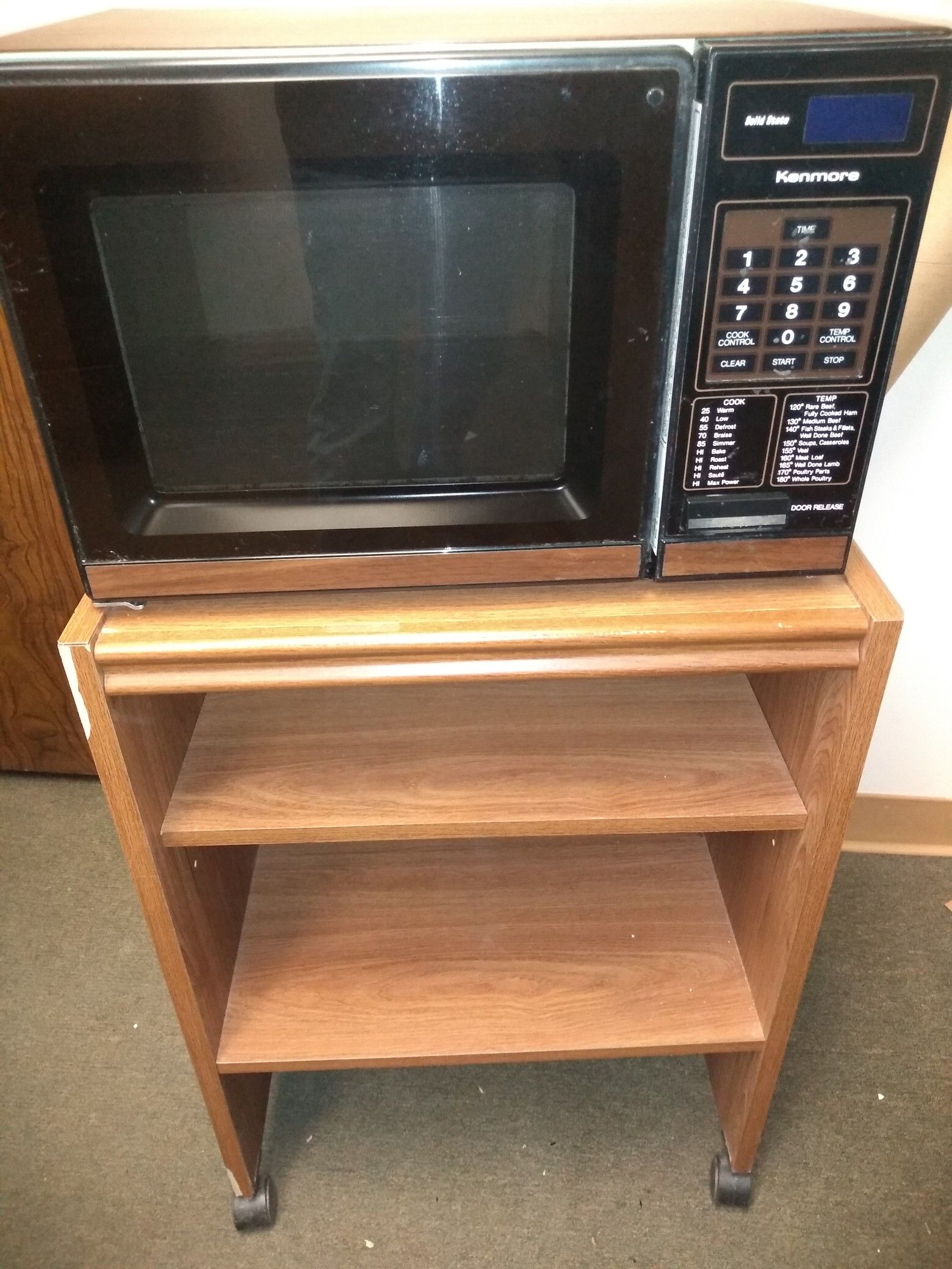 Kenmore microwave with cart. Working condition