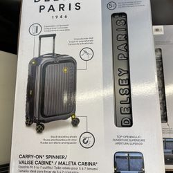 Delsey 22" Front Lid Carry-On Hardside Spinner ADO #: 5 Open Box .Price is Firm. Description : Top Lid Opening :Top lid opening saves space and