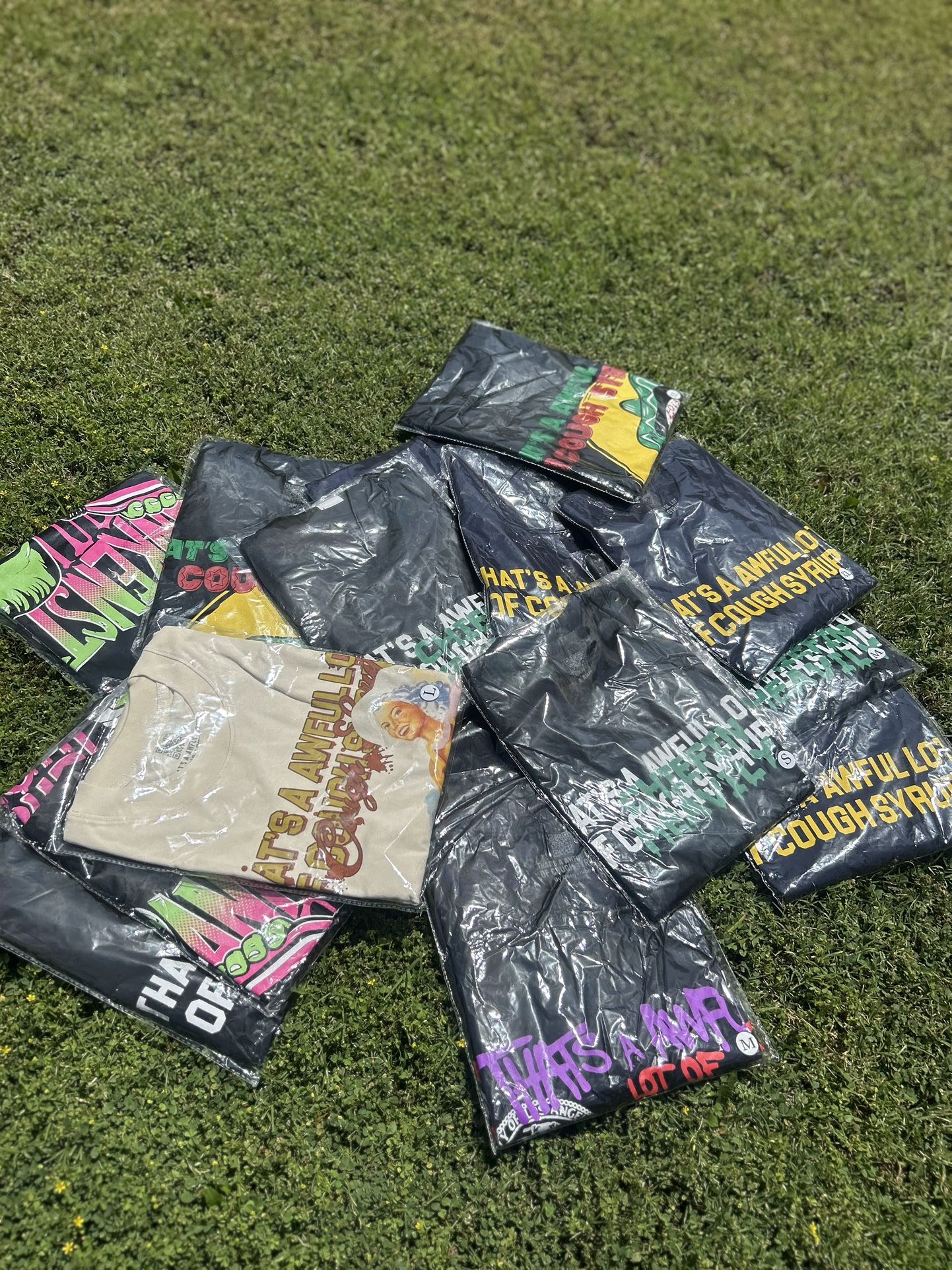 Awful Lot Of Cough Syrup Tees