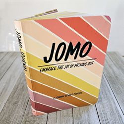JOMO Embrace the Joy of Missing Out Created and Illustrated by Kate Pocrass. Chronicle Books Copyright 2020. ISBN: 978-1-4-3.

Pre-owned in ex